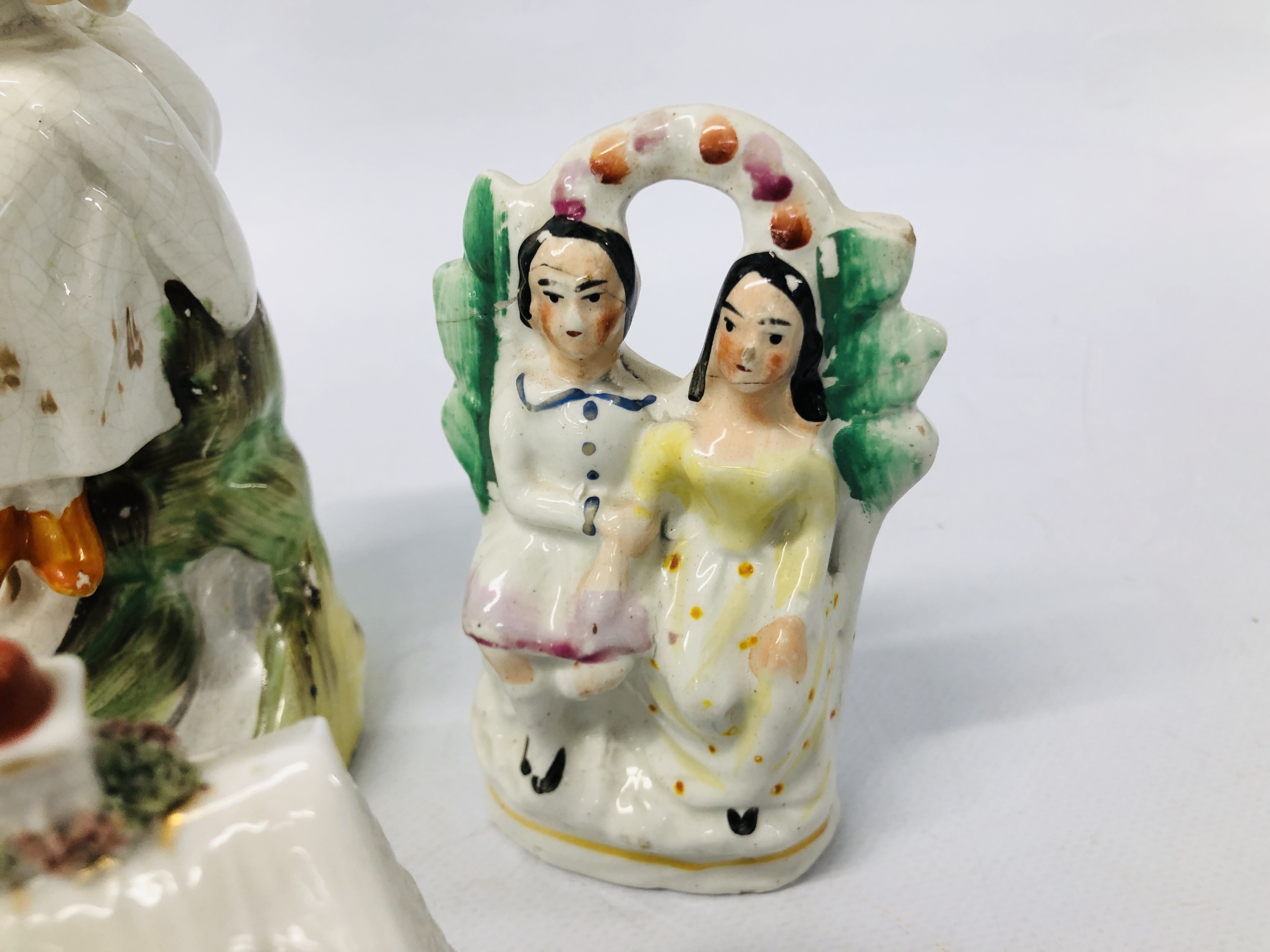 A PAIR OF STAFFORDSHIRE FIGURES A SEATED GIRL AND BOY (FOOT A/F HAIRLINE CRACK TO KNEE) EXTENSIVE - Image 5 of 14