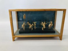 A CASED MINIATURE DISPLAY OF DANCING ANTS CARVED FROM BAMBOO (CASE SIZE WIDTH 25CM. DEPTH 10CM.