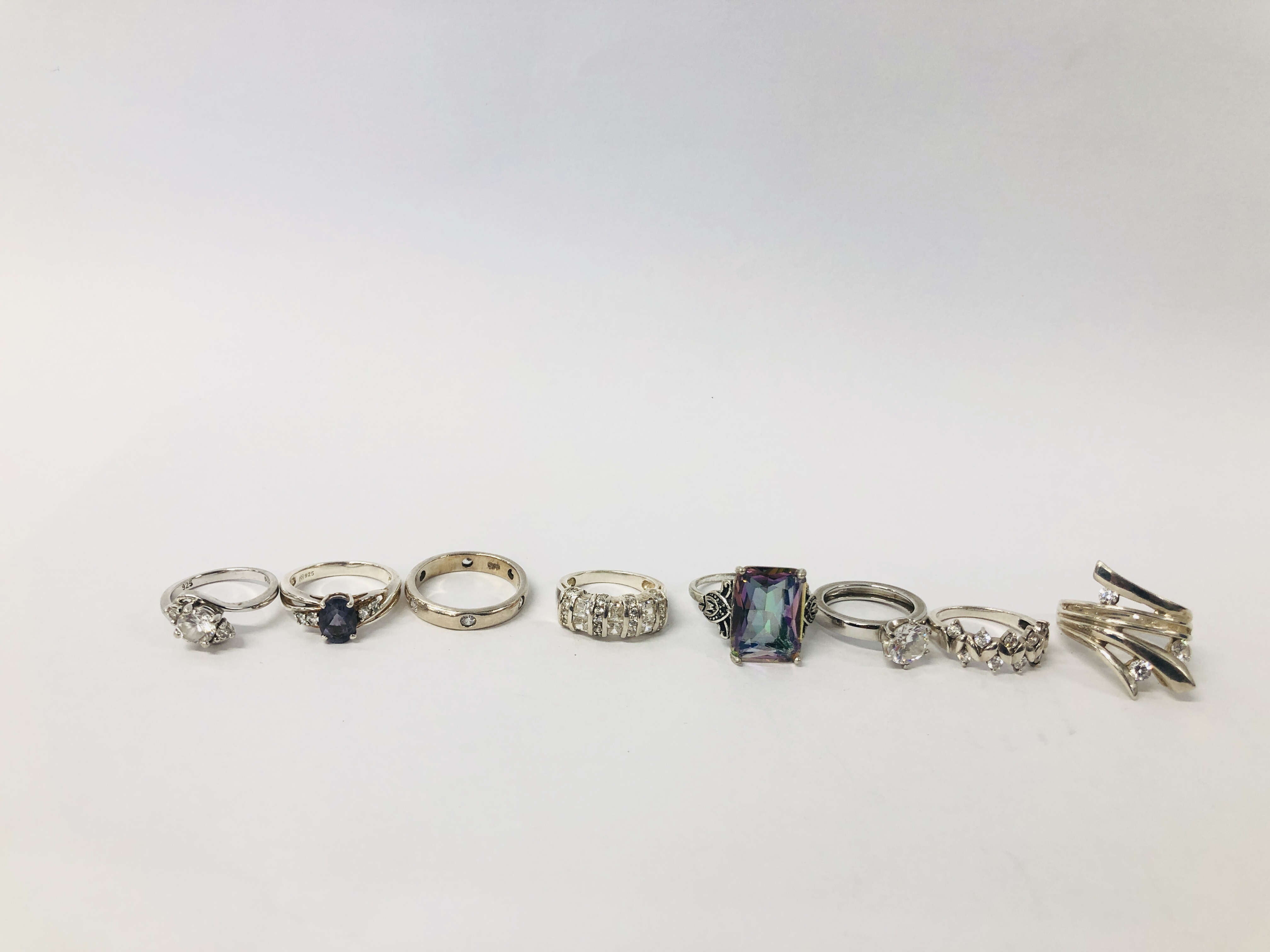 EIGHT ASSORTED DESIGNER SILVER RINGS