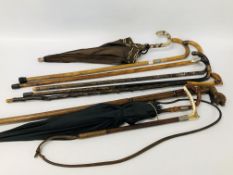 SIX ASSORTED VINTAGE WALKING STICKS TO INCLUDE FOUR HAVING SILVER BANDED DETAIL ALONG WITH TWO