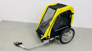 A DOUBLE CHILDS BIKE TRAILER