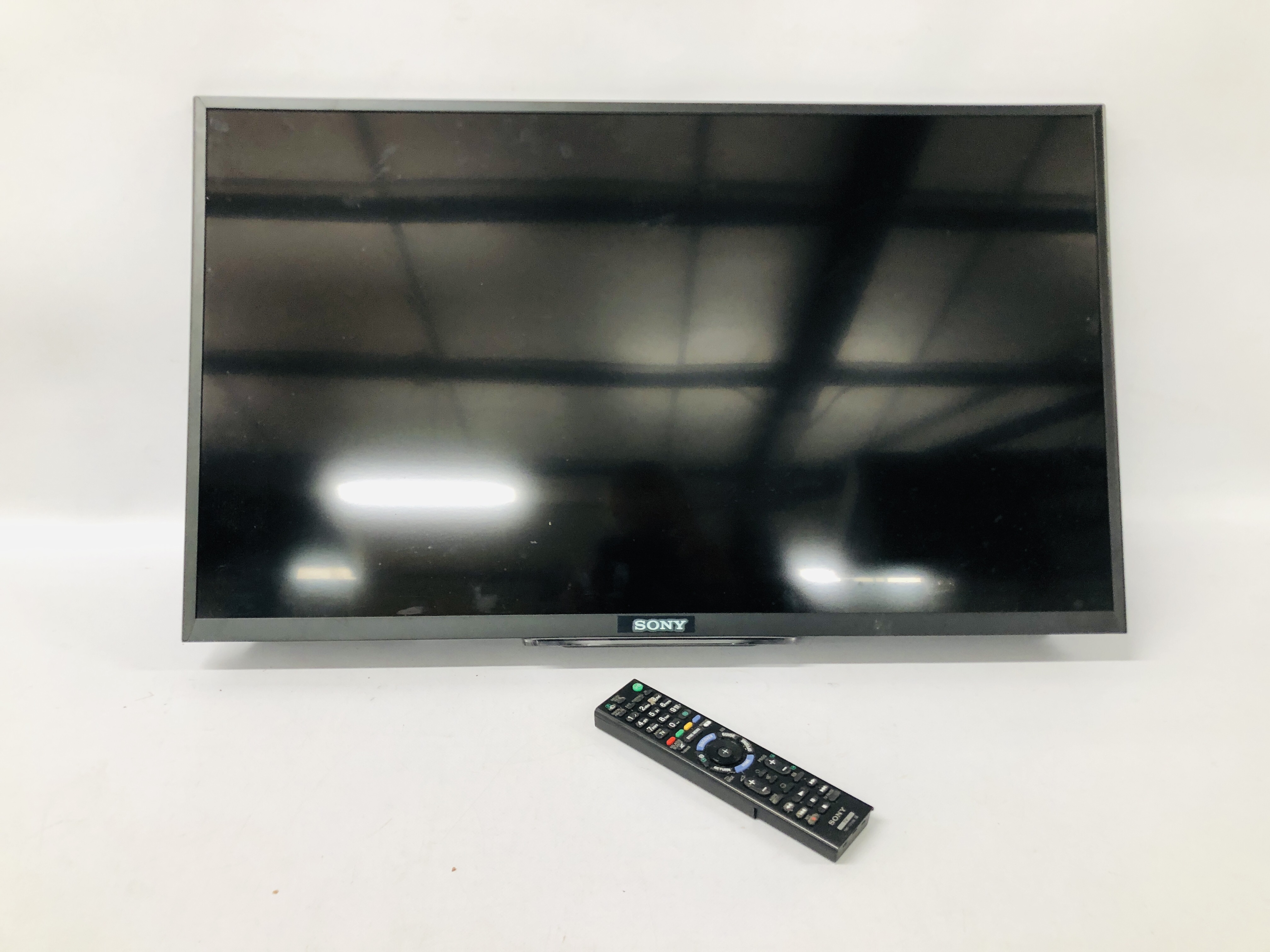 SONY 32 INCH TELEVISION MODEL KDL-32W705B WITH REMOTE CONTROL - SOLD AS SEEN