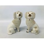 A PAIR OF C19TH STAFFORDSHIRE DOGS H 23.5CM.