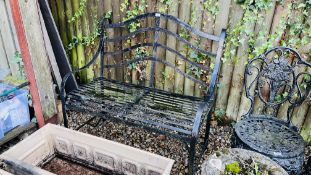 A BLACK PAINTED WROUGHT METAL GARDEN BENCH, LENGTH 102CM.