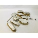 A PAIR OF SILVER BACKED CLOTHES BRUSHES MONOGRAMMED HJA,