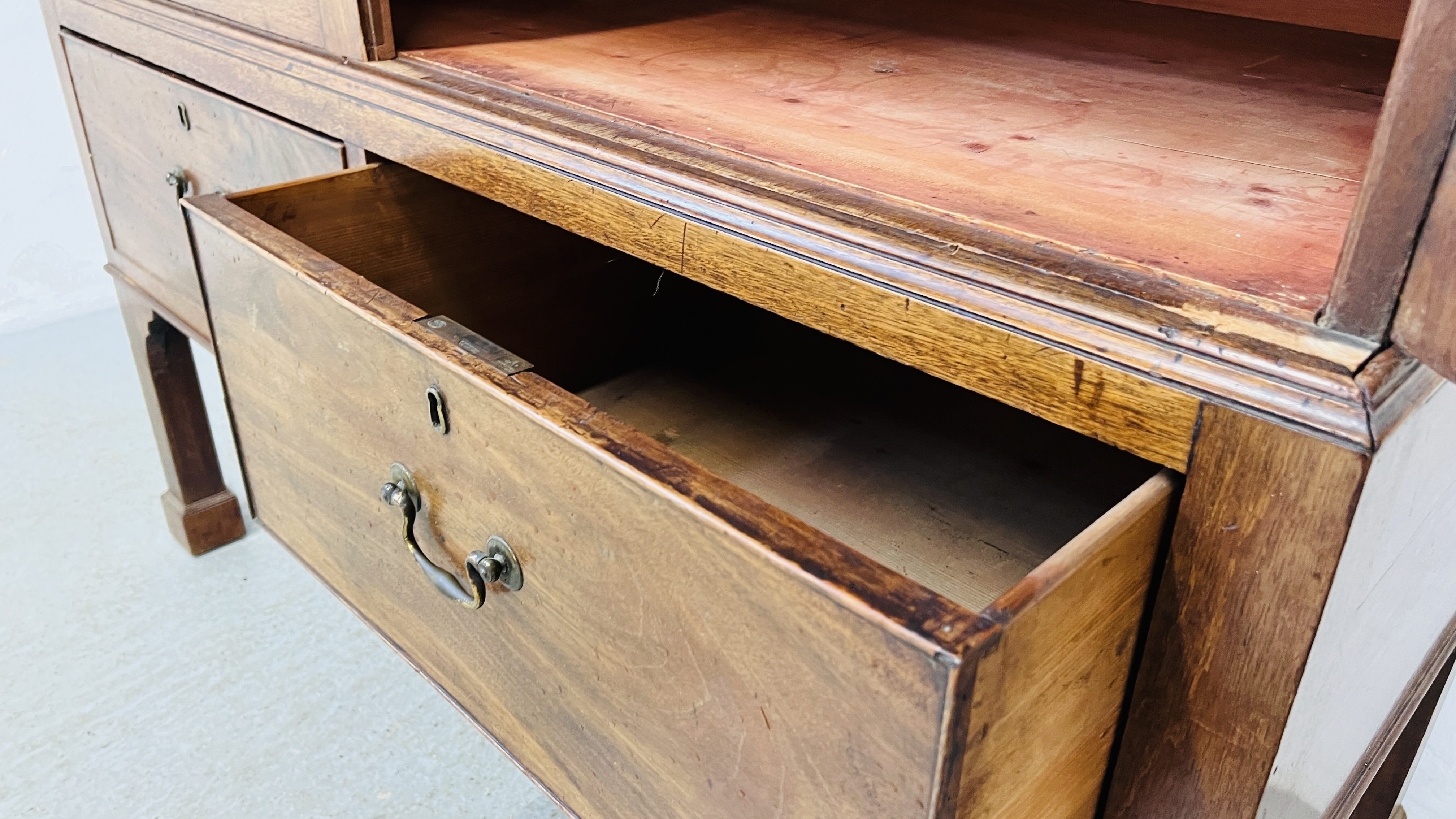 AN ANTIQUE VICTORIAN MAHOGANY TWO DOOR MAID'S CUPBOARD WITH SHELVED INTERIOR ON TWO DRAWER RAISED - Image 11 of 11