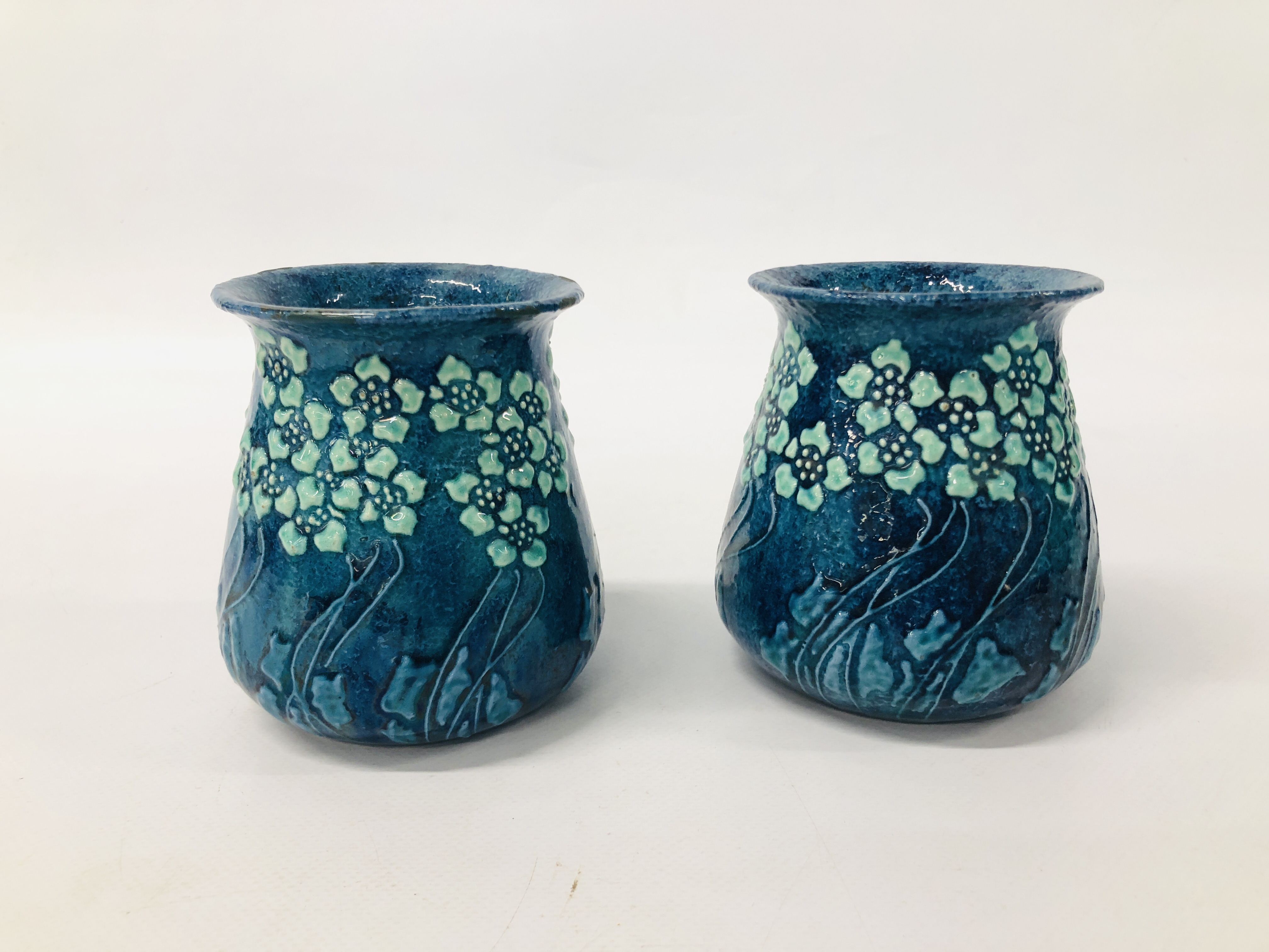 PAIR OF LIBERTY & CO. VASES BY FREDERICK RHEAD (SIGNS OF RESTORATION) HEIGHT 11CM.