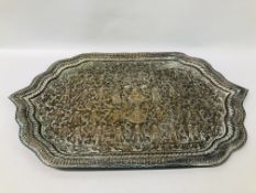 A LARGE BRASS SERVING TRAY WITH CHASED INDIAN DECORATION