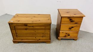 A HONEY PINE BLANKET BOX W 74CM, D 39CM, H 49CM ALONG WITH A THREE DRAWER HONEY PINE BEDSIDE CHEST.