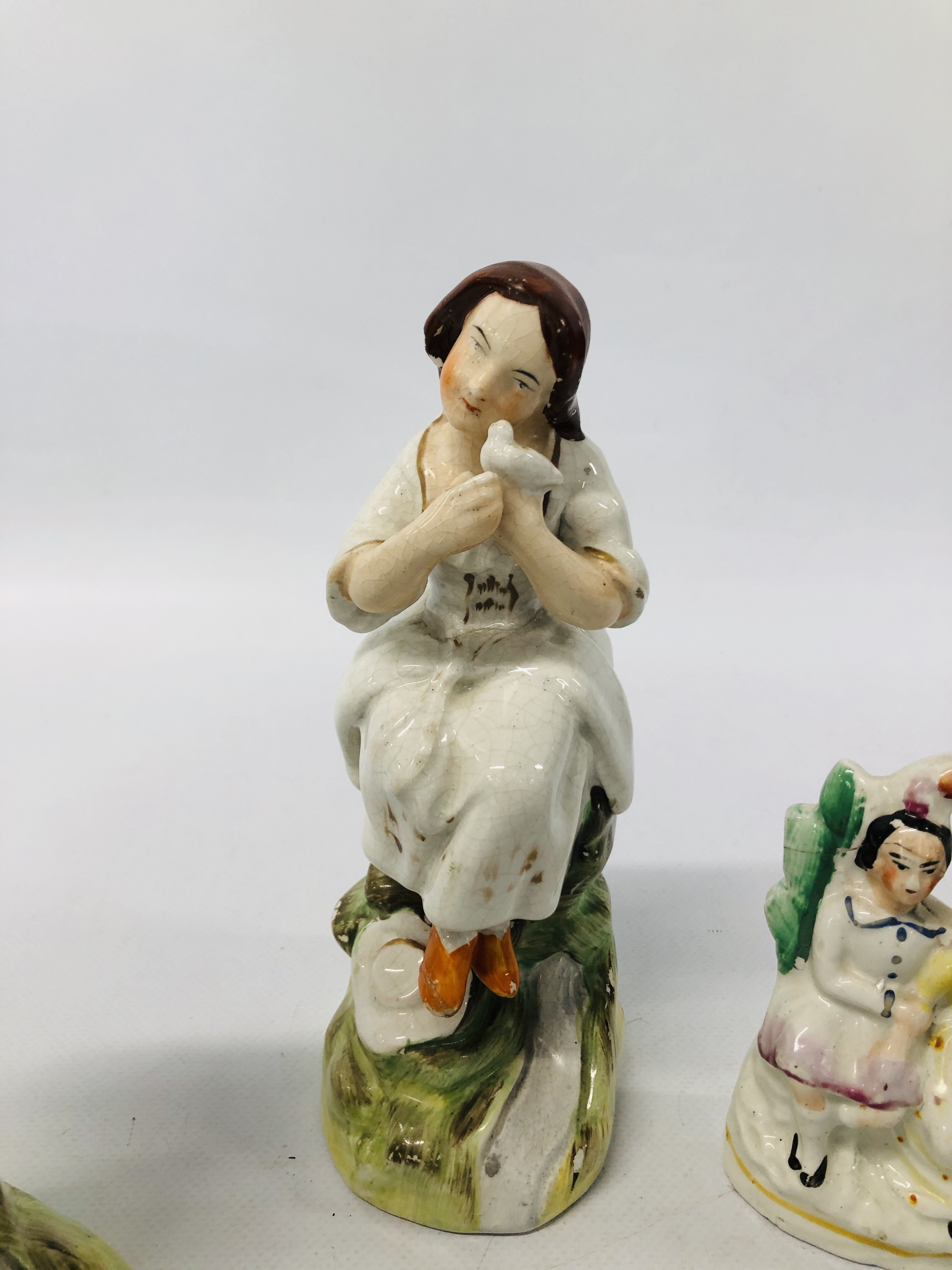 A PAIR OF STAFFORDSHIRE FIGURES A SEATED GIRL AND BOY (FOOT A/F HAIRLINE CRACK TO KNEE) EXTENSIVE - Image 8 of 14