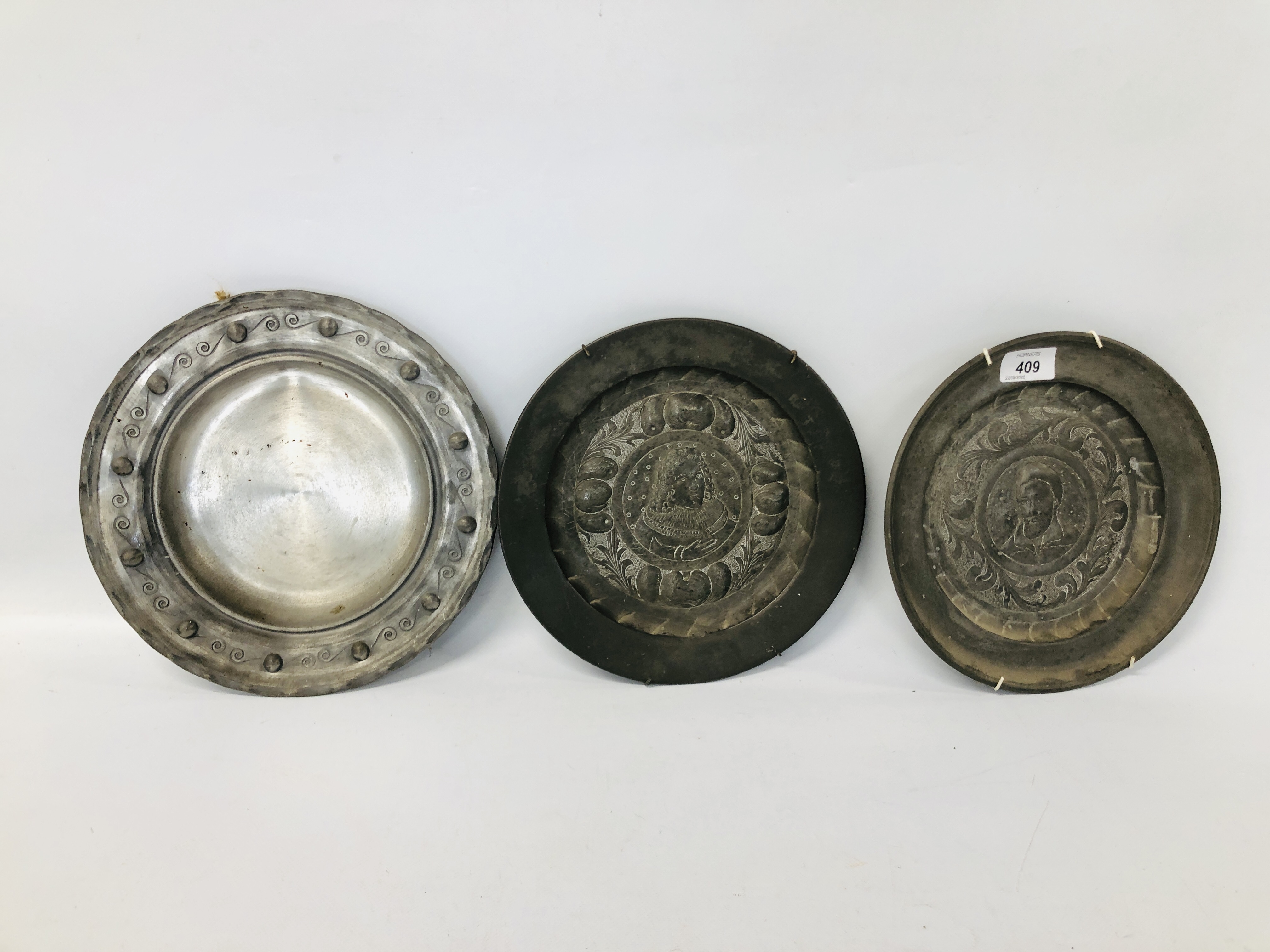 THREE PERIOD PEWTER PLATES/CHARGERS,