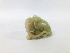 WELL CARVED CHINESE PALE CELADON JADE OF A MONKEY HOLDING A PEACH UPON THE BACK OF AN ELEPHANT,