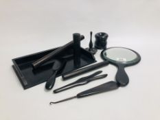 AN EBONY DRESSING TABLE SET COMPRISING 10 PIECES
