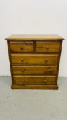 A HONEY PINE TWO OVER THREE CHEST OF DRAWERS WIDTH 89CM. DEPTH 42CM. HEIGHT 95CM.