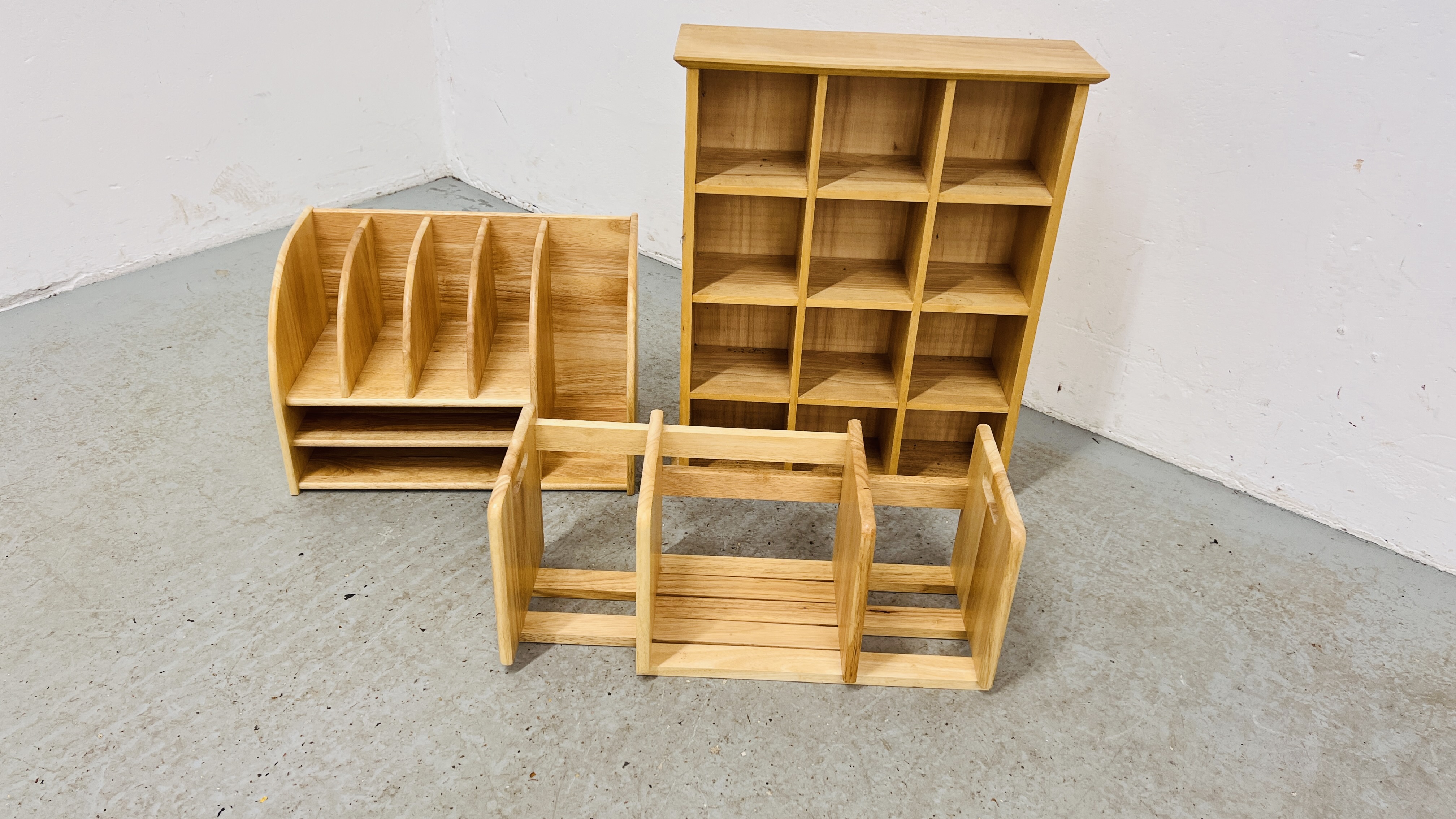 A BEECHWOOD DESK TIDY ALONG WITH EXTENDING BOOK RACK AND 12 PIGEON HOLE SHELVING RACK.
