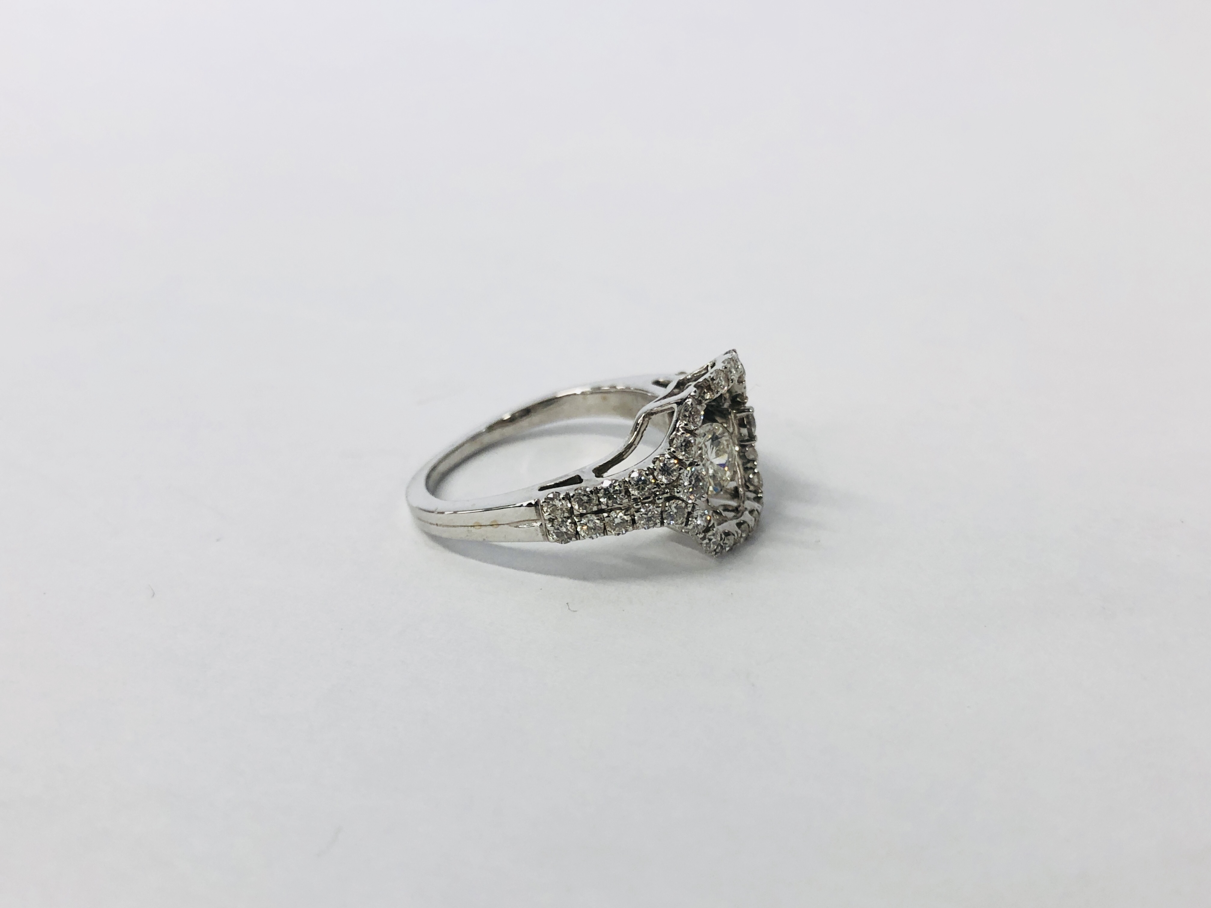 A MODERN CONTEMPORARY DIAMOND SET RING, NO HALLMARK, THE CENTRAL PIVOTING DIAMOND APPROX . - Image 3 of 10