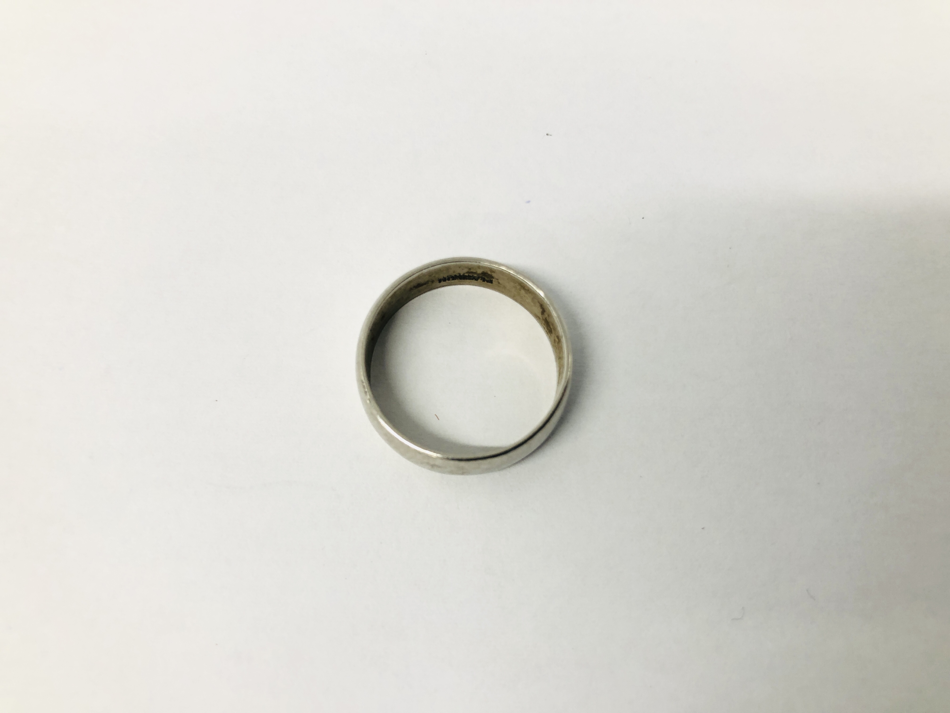 A WEDDING BAND MARKED PLATINUM. - Image 2 of 6