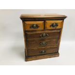 A VINTAGE TWO OVER THREE MINIATURE SET OF DRAWERS WITH BRASS LION HEAD EMBOSSED HANDLES WIDTH 36CM.