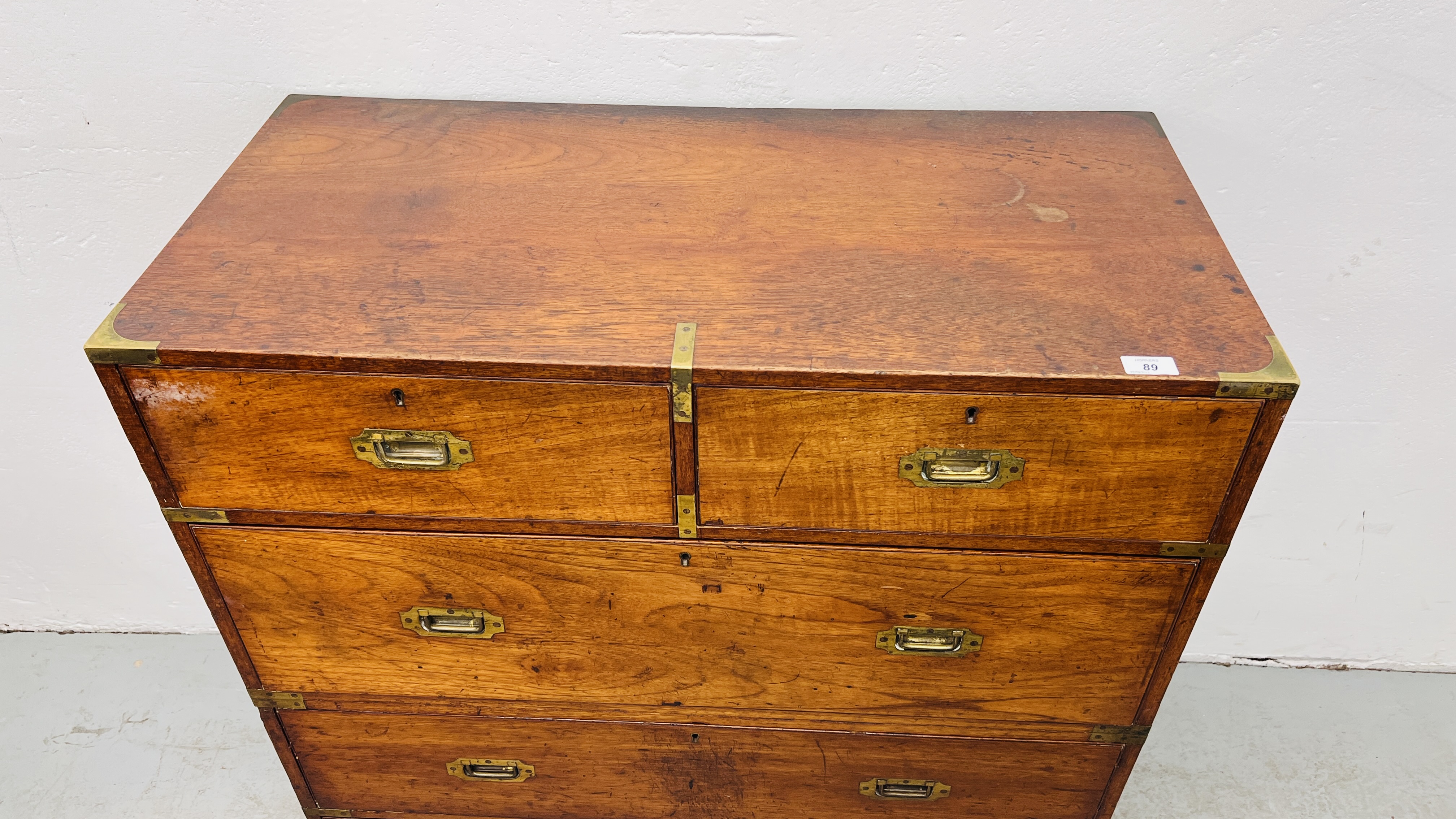 ANTIQUE MAHOGANY TWO OVER THREE CAMPAIGN CHEST ON BUN FEET WITH BRASS HANDLES AND BANDING BEARING - Image 2 of 15