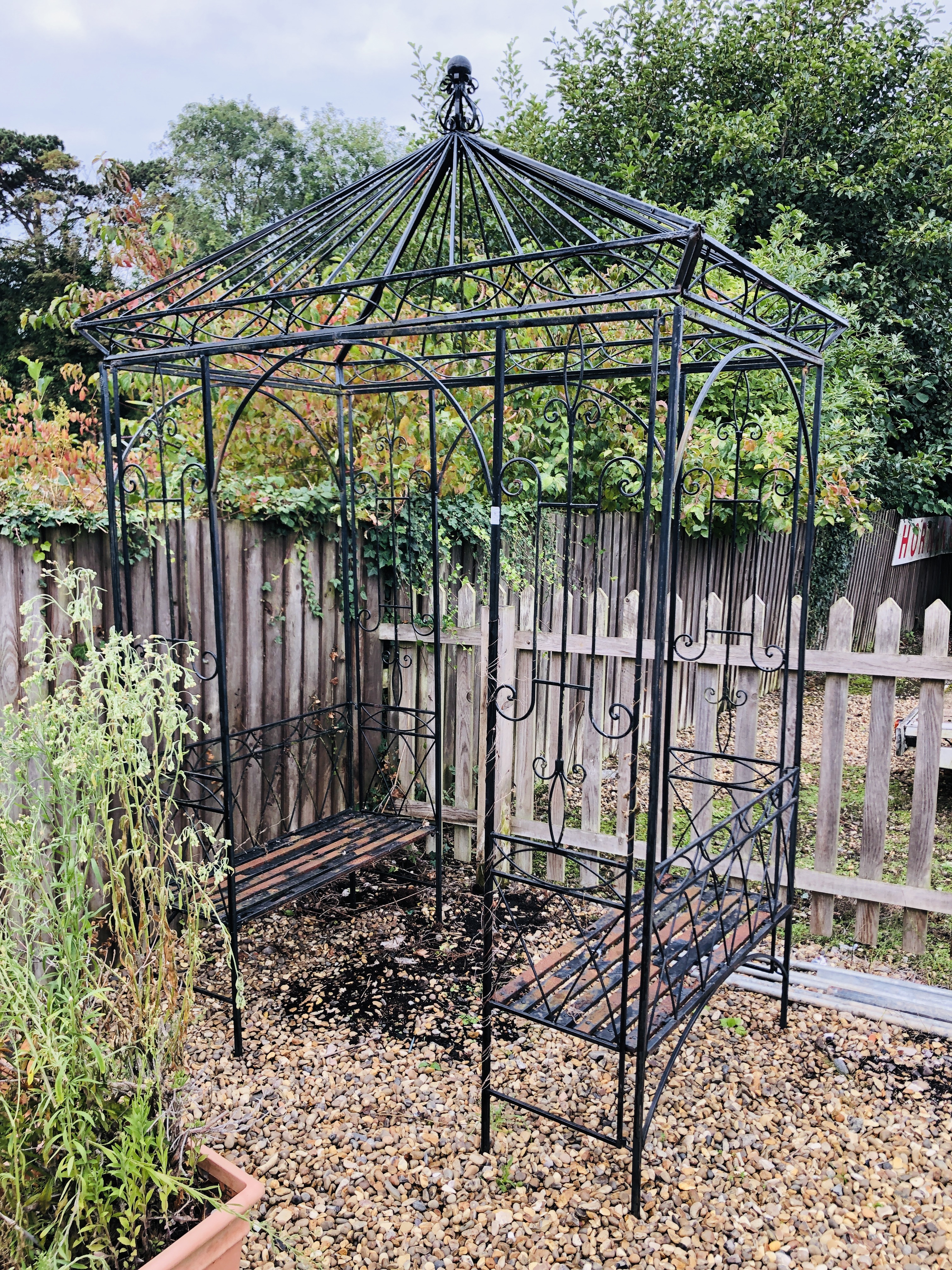 A METAL CRAFT GARDEN ARBOUR SEAT AND CANOPY - REQUIRES REPAIR.