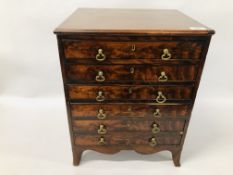 A LATE GEORGE III MAHOGANY SIX DRAWER MINIATURE CHEST ON SPLAYED BRACKET FEET, W 40.