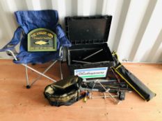 A SHAKESPEARE FISHING BOX CONTAINING FISHING ACCESSORIES TO INCLUDE ROD RESTS, BAIT CATAPULTS,