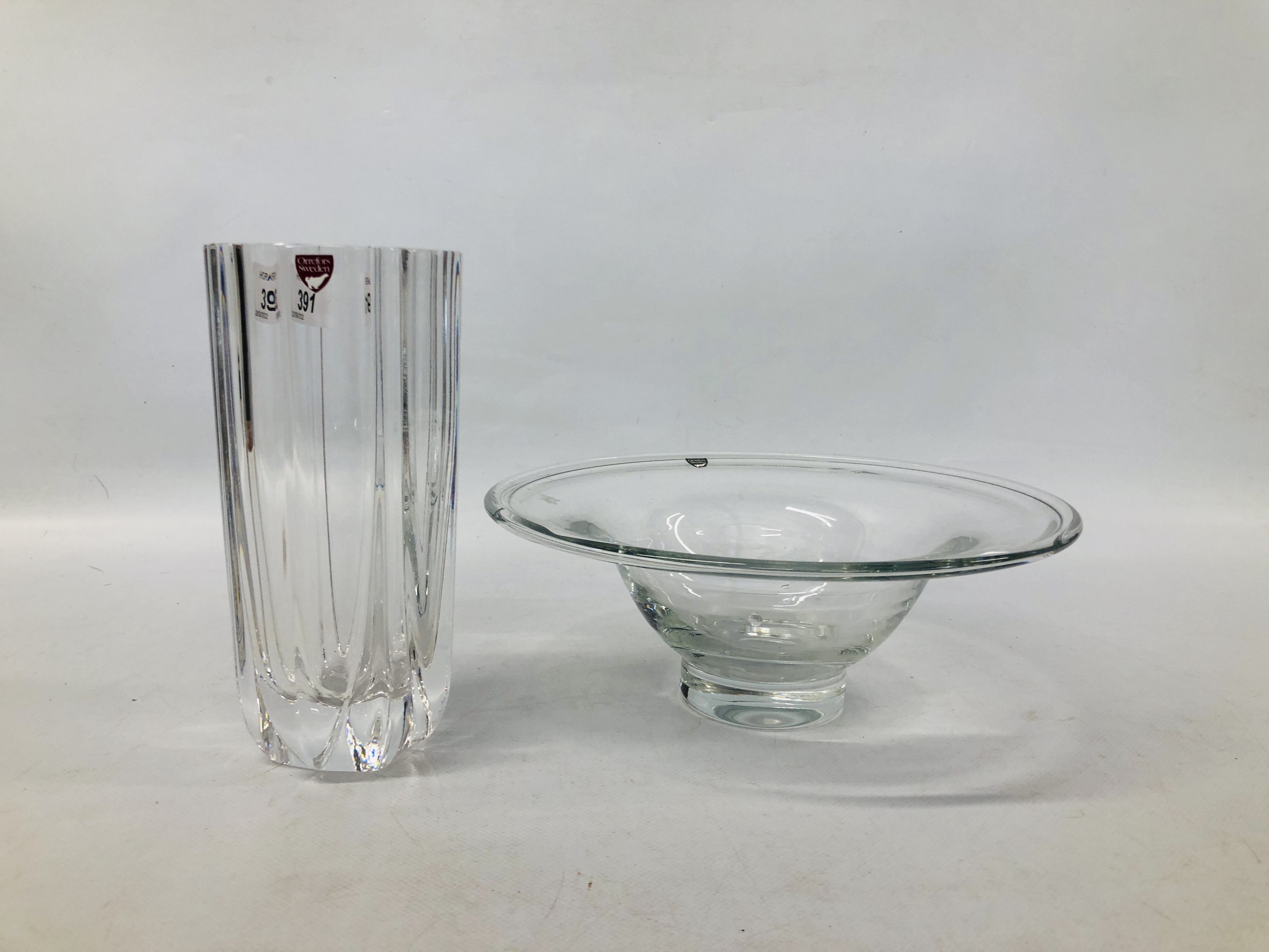 A ORREFORS SOLID GLASS VASE HEIGHT 20CM. ALONG WITH ORREFORS GLASS BOWL DIA. 26CM.