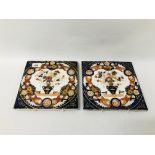 A PAIR OF C19TH IMARI DECORATED PORCELAIN TILES 23 X 23CM.