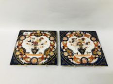 A PAIR OF C19TH IMARI DECORATED PORCELAIN TILES 23 X 23CM.