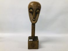 VINTAGE ETHNIC CARVED SCULPTURE ON A SQUARE BASE - H 50CM.