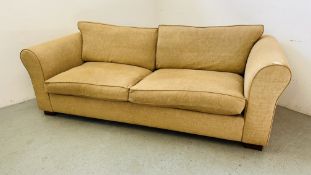 A GOOD QUALITY FAWN UPHOLSTERED MODERN THREE SEATER SOFA L 225CM, D 95CM.