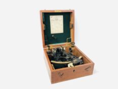 A VINTAGE CASED "HUSAN" SEXTANT NO. 35935 BY HENRY HUGHES & SONS LTD.