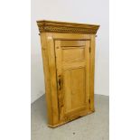 A GEORGE III PINE HANGING CORNER CUPBOARD, H 134CM.