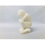 HARDSTONE SCULPTURE OF A SEATED NUDE LADY