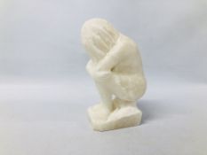 HARDSTONE SCULPTURE OF A SEATED NUDE LADY