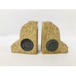 A PAIR OF WW2 GRANITE BOOKENDS RELATING TO THE HOUSES OF PARLIAMENT AND THE HOUSE OF COMMONS.