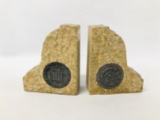 A PAIR OF WW2 GRANITE BOOKENDS RELATING TO THE HOUSES OF PARLIAMENT AND THE HOUSE OF COMMONS.