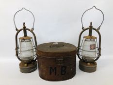 PAIR OF VINTAGE BRITISH MADE TILLY LAMPS MARKED "VERITAS" ALONG WITH A VINTAGE TIN HAT BOX.