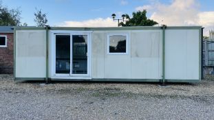 A PORTABLE OFFICE CABIN 8.4M. (27FT. 7INCH) X 3M. (9FT. 9INCH).