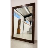 AN IMPRESSIVE HIGH QUALITY OVERSIZE BEVELLED WALL MIRROR IN BESPOKE HARDWOOD FRAME - HEIGHT 200CM.