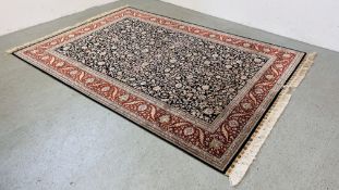 A PERSIAN STYLE BLUE/RED PATTERNED CARPET SQUARE WIDTH 184CM. LENGTH 266CM.