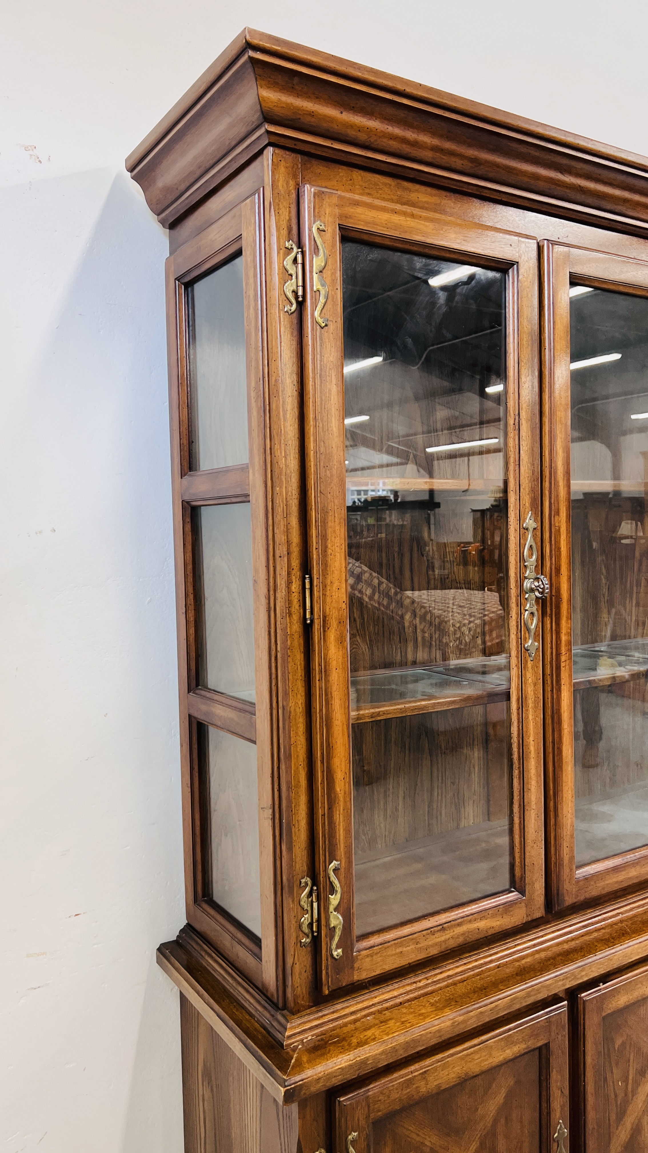 A REPRODUCTION ANTIQUE FINISH DISPLAY CABINET WITH THREE DOOR CABINET BASE W 149CM, D 43CM, H 202CM. - Image 6 of 9