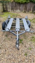A METAFO GALVANISED MOTORCYCLE CAR TRAILER (THREE BIKE CAPACITY) - ROAD TYRES REQUIRE REPLACEMENT,