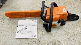 A STIHL MS 180 PETROL CHAIN SAW WITH INSTRUCTIONS - SOLD AS SEEN