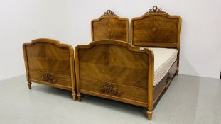 A MATCHED PAIR OF FRENCH SINGLE BEDSTEADS WITH CARVED RIBBON & GARLAND DETAIL COMPLETE WITH