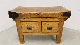 A VINTAGE BEECH WOOD BUTCHERS BLOCK STANDING ON ANTIQUE WAXED PINE TWO DRAWER STAND (THE DRAWERS