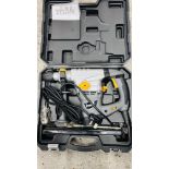 A CASED TITAN HEAVY DUTY SDS POWER DRILL WITH INSTRUCTIONS AND ACCESSORIES - SOLD AS SEEN