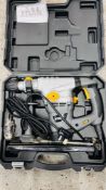 A CASED TITAN HEAVY DUTY SDS POWER DRILL WITH INSTRUCTIONS AND ACCESSORIES - SOLD AS SEEN