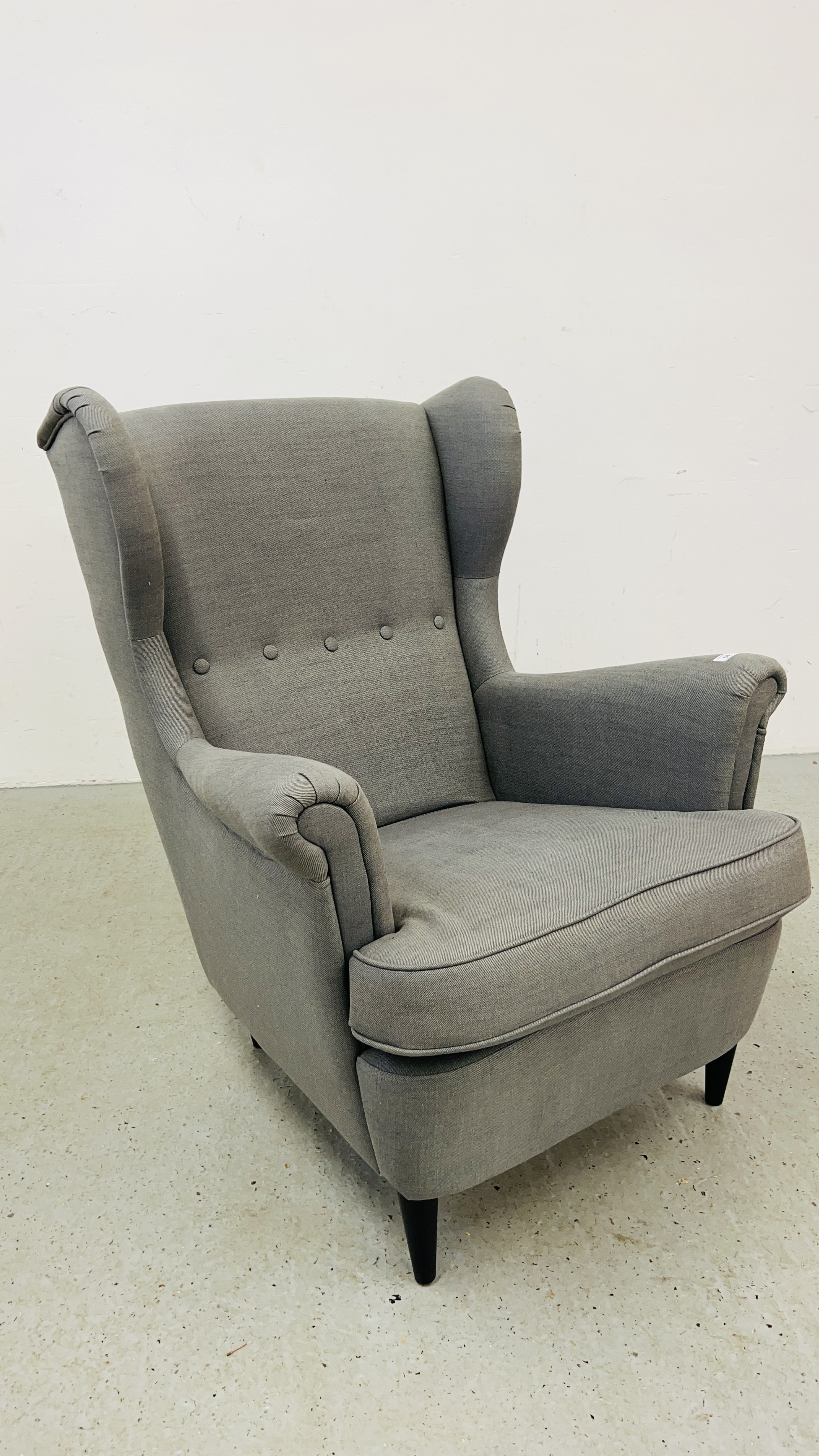 A MODERN IKEA DESIGNER WINGED ARM CHAIR GREY UPHOLSTERED.