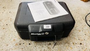 A MASTER LOCK FIRE PROOF SAFE BOX WITH INSTRUCTIONS